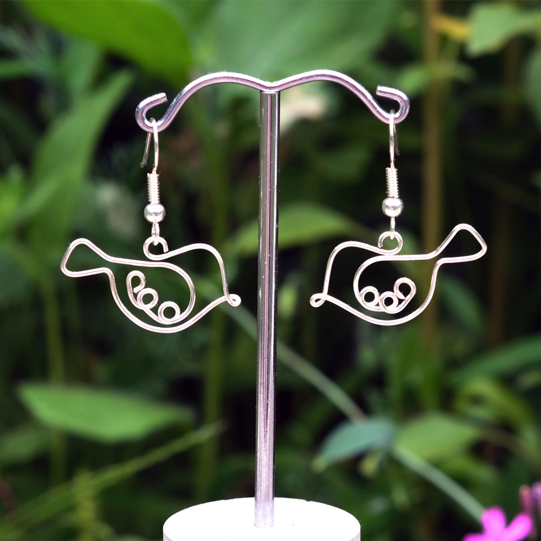 handmade pendant earrings shaped like birds, made from silver wire